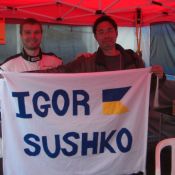 Igor Sushko with fan Satoshi and the custom-made banner!
