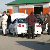 People and Cars on the Paddock