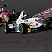 The Ukrainian and Japanese flag-colored FCJ formula car raced by Igor Sushko at Suzuka Circuit.