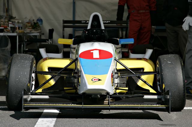 The Ukrainian and Japanese flag-colored FCJ formula car raced by Igor Sushko at Suzuka Circuit.