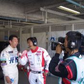 Maejima Shuji gets interviewed after his stint in the car at Suzuka.