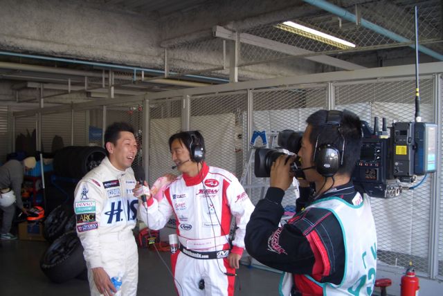 Maejima Shuji gets interviewed after his stint in the car at Suzuka.