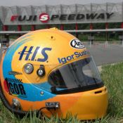 Igor Sushko's newly designed helmet, featurng the &quot;1gor&quot; logo and the H.I.S. Travel Agency sponsor logo.