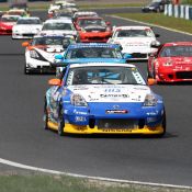 Parade lap for the Super Taikyu series at Okayama Circuit. The H.I.S. Nissan Fairlady Z, piloted by Igor Sushko and Maejima Shyu