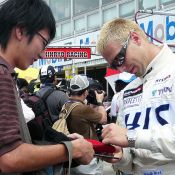 Igor Sushko signing autographs.