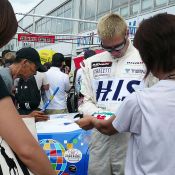 Igor Sushko signing autographs.