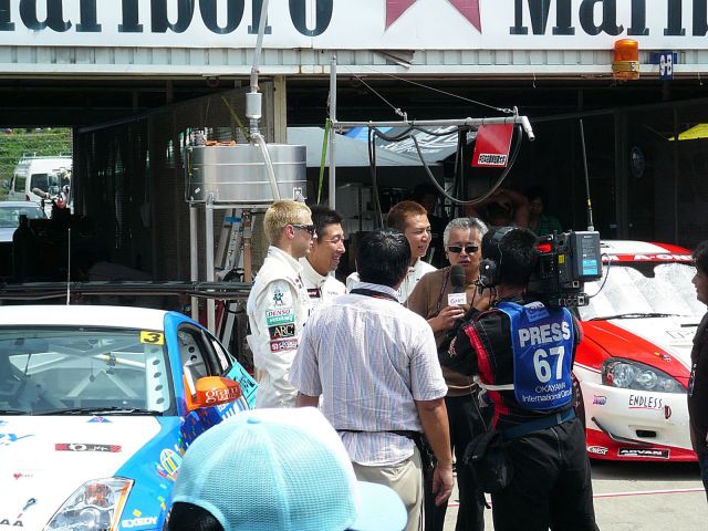 Igor Sushko and Maejima Shyuji being interviewed after qualifying on pole.